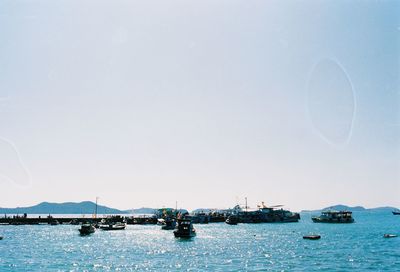 Scenic view of boats in sea