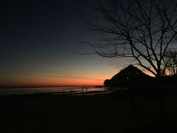 Scenic view of sea against sky at sunset