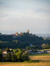 Buildings in city against sky