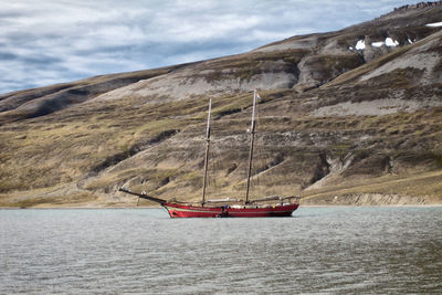 Boats moored in sea