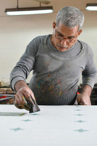 Man working on table