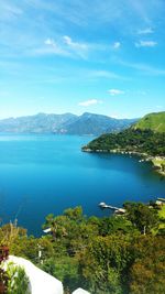 Scenic view of sea against blue sky