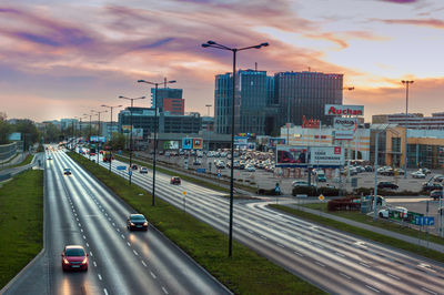 High angle view of city street against sky during sunset