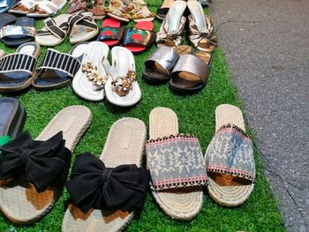 High angle view of shoes on grass