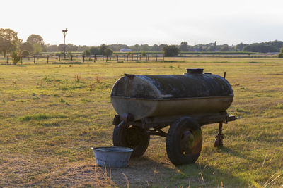 Horse cart on field