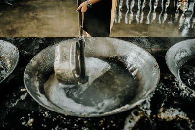 Midsection of woman preparing food