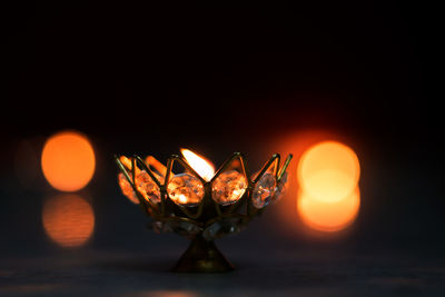 Close-up of illuminated light bulb