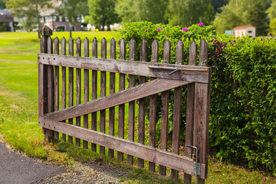View of wooden fence in park