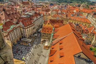 High angle view of houses and street in city