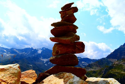 Stack of rocks against sky