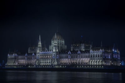 Illuminated city lit up at night