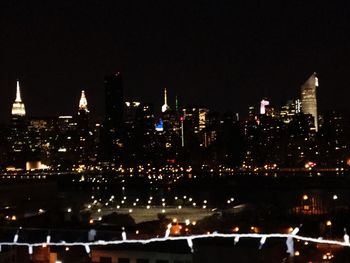 Illuminated cityscape at night