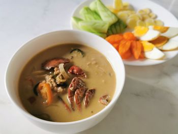 High angle view of soup in bowl on table