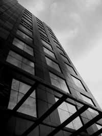 Low angle view of office building against sky