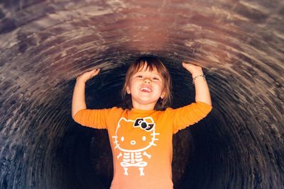 Portrait of smiling girl standing