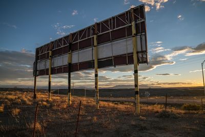 Built structure against sky during sunset