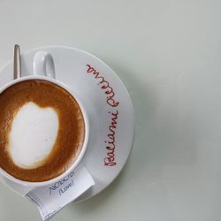 Directly above shot of coffee cup on table