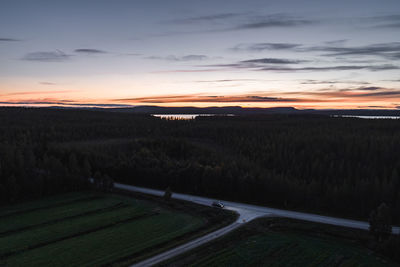 Scenic view of landscape against sky during sunset