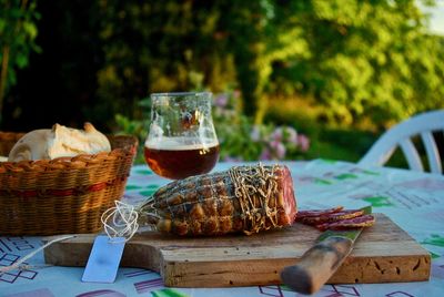 Glass of wine and glasses on table