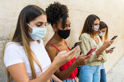 Young woman using mobile phone