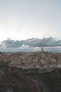 Castle on mountain against sky