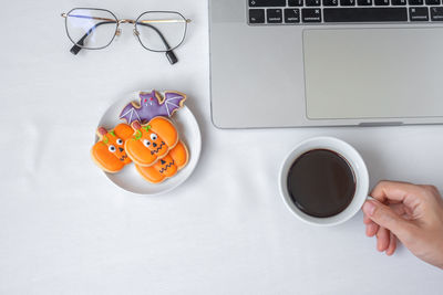 High angle view of coffee cup on table