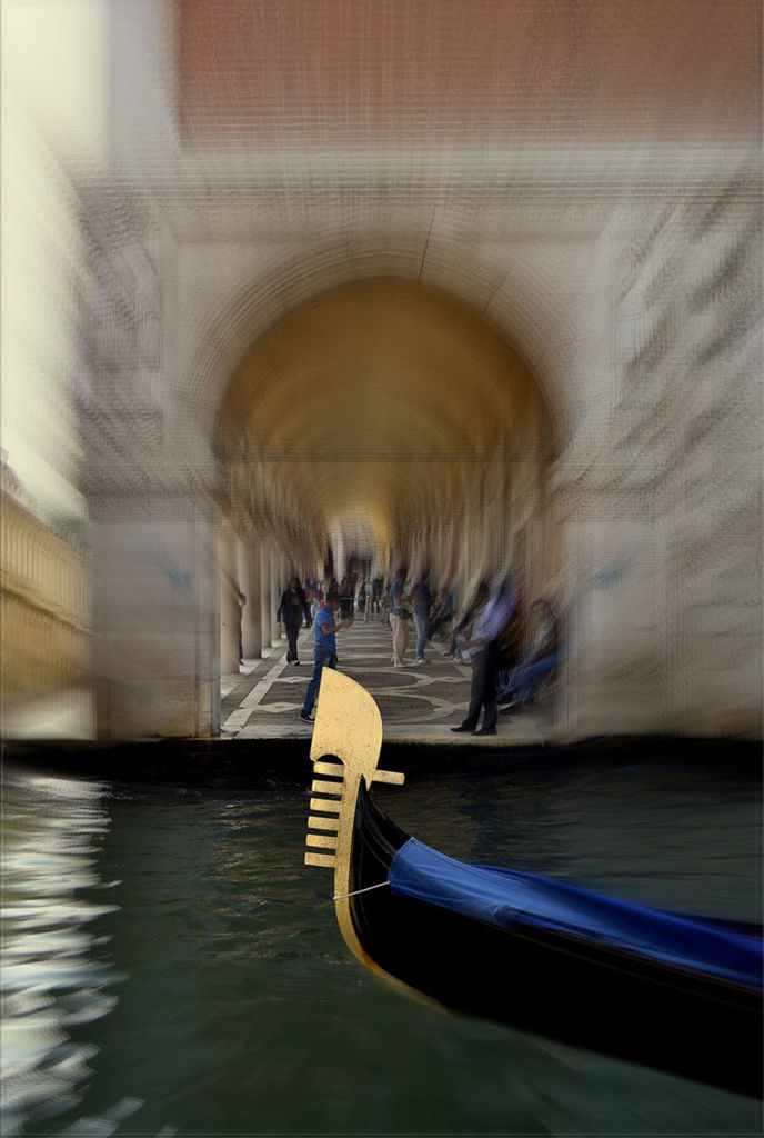 PEOPLE IN BOAT ON CANAL