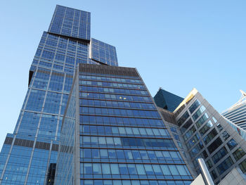 Low angle view of modern building against clear sky