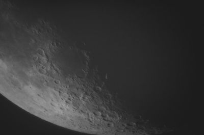 Low angle view of moon in sky at night