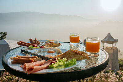 Food on table against mountain