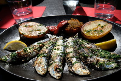 Close-up of fish in plate on table