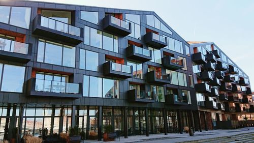 Low angle view of modern building against sky