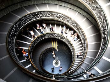 High angle view of people on spiral staircase