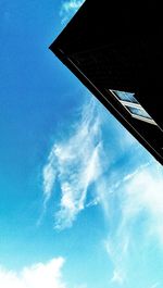 Low angle view of built structure against blue sky