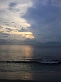 Scenic view of sea against sky at sunset