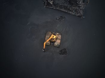 High angle view of person swimming in lake