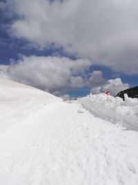 Snow covered mountain against sky