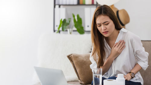 Young woman using mobile phone