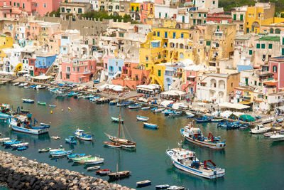 High angle view of boats moored at harbor