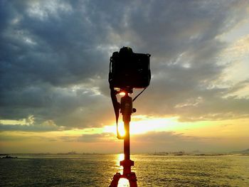 Scenic view of sea at sunset