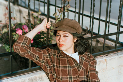 Portrait of young woman looking away