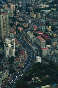 High angle view of street amidst buildings in city