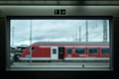 Blurred motion of train seen through window