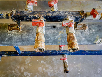 High angle view of water pipe on wall