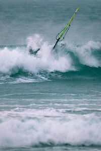 Man surfing in sea