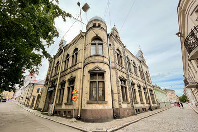 Low angle view of historic building against sky