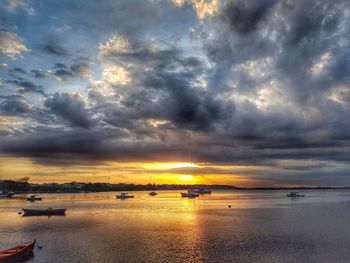 Scenic view of sea against dramatic sky