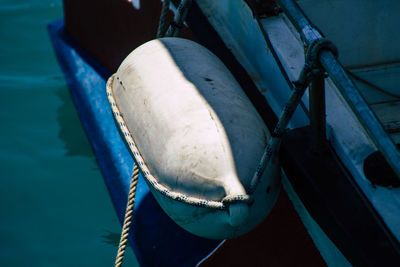 High angle view of rope tied on boat