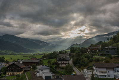 High angle view of townscape against cloudy sky