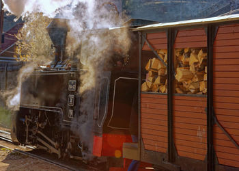 Steam train on railroad tracks